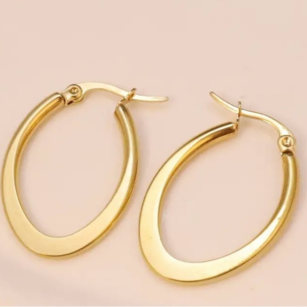 Stainless Steel Oval Hoop Earrings Plated in 18K Yellow Gold